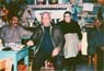 Καφενείο στο Παλαιοχώρι Λέσβου, στις 24/02/1996. Διακρίνονται από αριστερά προς τα δεξιά: Δημήτρης Ψαρρός, Αληγιάννης και η ιδιοκτήτρια του καφενείου.